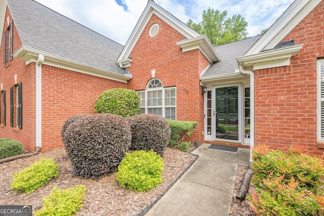 2870 Jay Oak Dr, Dacula, GA 30019 - entrance to property with roof with shingles and brick siding
