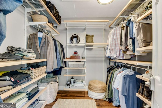 14905 Thompson Rd, Milton, GA 30004 - walk in closet with wood finished floors