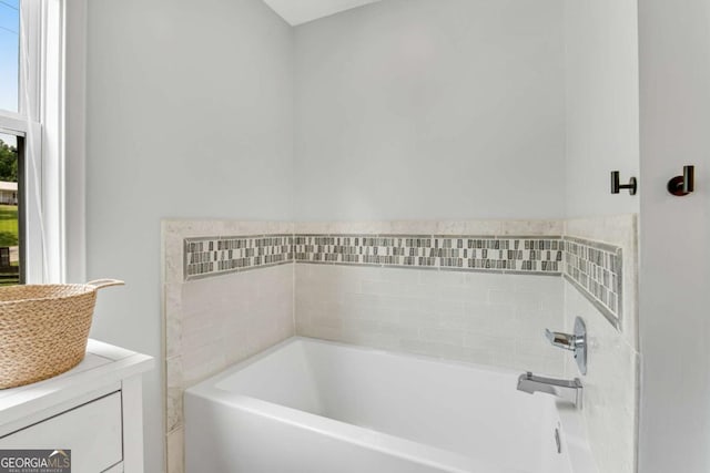 14905 Thompson Rd, Milton, GA 30004 - bathroom with a garden tub and vanity
