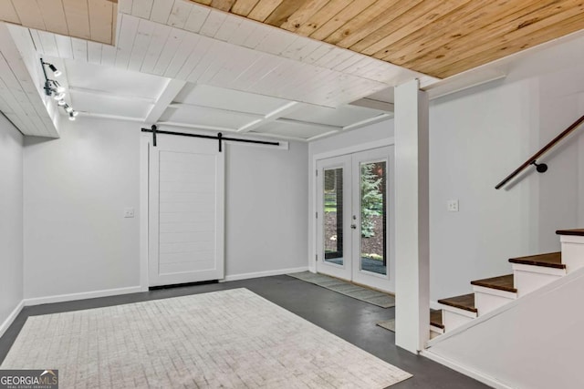 14905 Thompson Rd, Milton, GA 30004 - basement featuring a barn door, stairs, baseboards, wood ceiling, and french doors