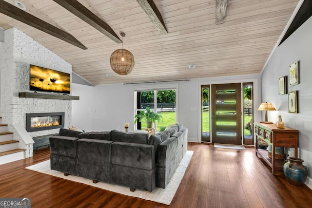 14905 Thompson Rd, Milton, GA 30004 - living area with wood ceiling, wood finished floors, a stone fireplace, and baseboards