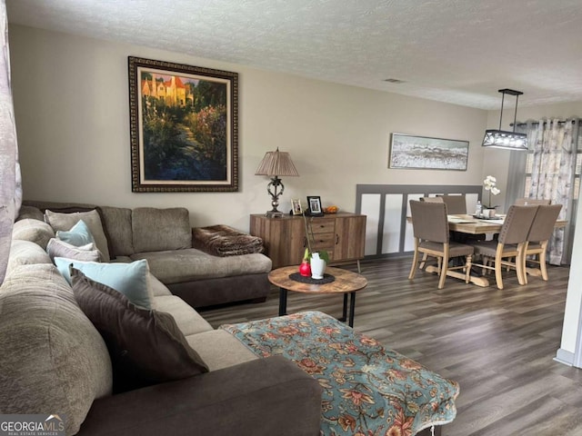 4678 Browns Mill Ferry Rd, Lithonia, GA 30038 - living room with wood finished floors and a textured ceiling