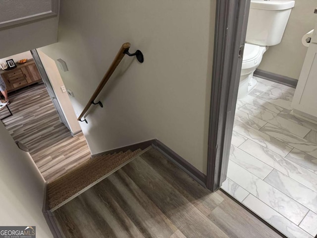 4678 Browns Mill Ferry Rd, Lithonia, GA 30038 - staircase with baseboards and marble finish floors