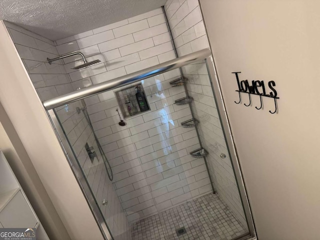 4678 Browns Mill Ferry Rd, Lithonia, GA 30038 - full bathroom featuring a shower stall and a textured ceiling