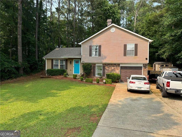 4678 Browns Mill Ferry Rd, Lithonia, GA 30038 - tri-level home featuring concrete driveway, a chimney, an attached garage, a front yard, and view of wooded area