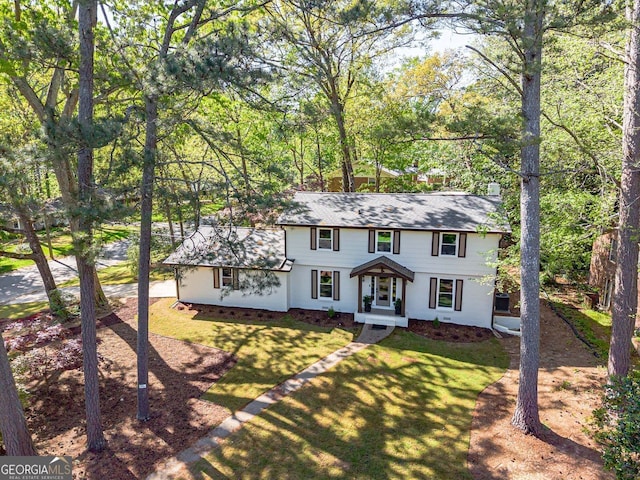 4446 Huntington Cir, Atlanta, GA 30338 - view of front facade with a front lawn