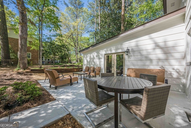 4446 Huntington Cir, Atlanta, GA 30338 - view of patio with french doors, outdoor dining area, and an outdoor living space