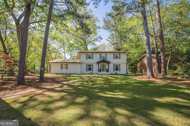 4446 Huntington Cir, Atlanta, GA 30338 - colonial house with a front lawn