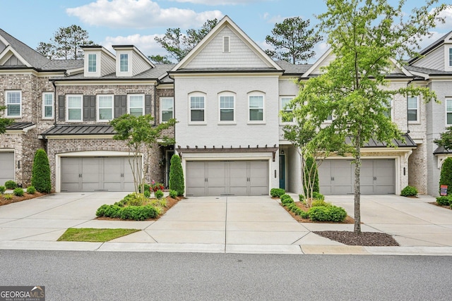 20056 Windalier Way, Roswell, GA 30076 - townhome / multi-family property featuring concrete driveway, brick siding, and a garage
