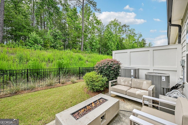 20056 Windalier Way, Roswell, GA 30076 - view of yard with central air condition unit, an outdoor living space with a fire pit, and a patio area