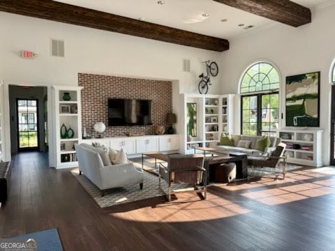 20056 Windalier Way, Roswell, GA 30076 - living room featuring beamed ceiling, dark wood-style flooring, and a towering ceiling