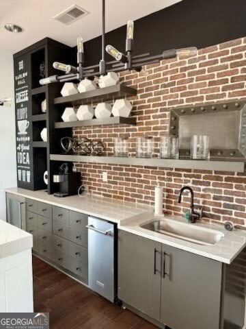 20056 Windalier Way, Roswell, GA 30076 - bar with a sink, dark wood-style flooring, and decorative backsplash