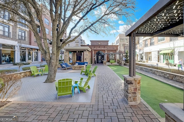 20056 Windalier Way, Roswell, GA 30076 - view of patio featuring a game area and an outdoor living space with a fire pit