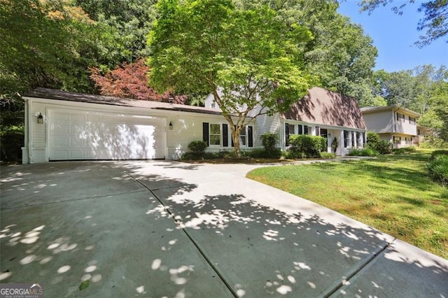 4234 Long Branch Ct, Brookhaven, GA 30319 - view of front facade featuring driveway, an attached garage, and a front yard