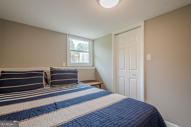205 Plantation Rd SW, Smyrna, GA 30082 - bedroom featuring baseboards and a closet