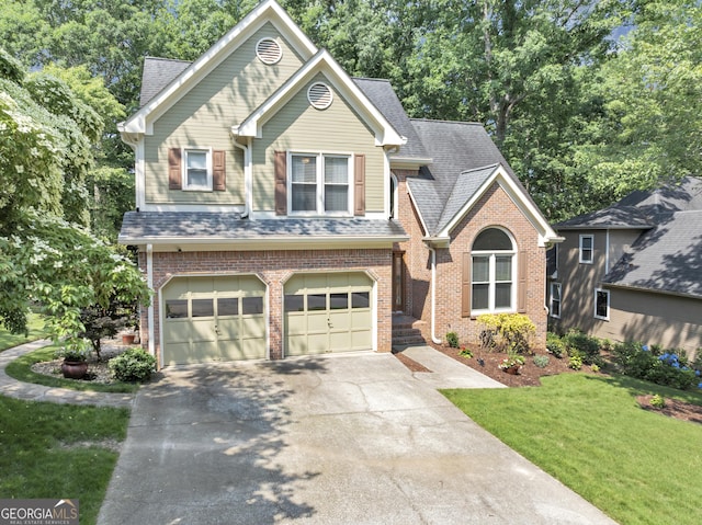 3535 Fairgreen Ct, Douglasville, GA 30135 - view of front facade featuring a front yard, an attached garage, brick siding, and driveway