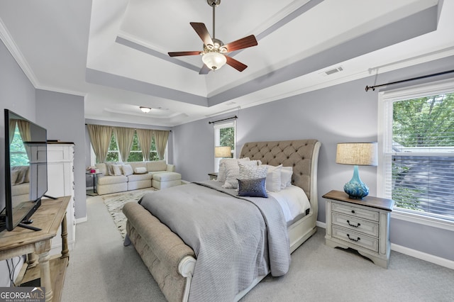 3535 Fairgreen Ct, Douglasville, GA 30135 - bedroom featuring a raised ceiling, light colored carpet, crown molding, baseboards, and a ceiling fan