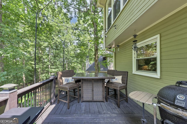 3535 Fairgreen Ct, Douglasville, GA 30135 - wooden deck with a grill and outdoor dining area