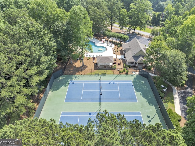 3535 Fairgreen Ct, Douglasville, GA 30135 - view of tennis court with a view of trees
