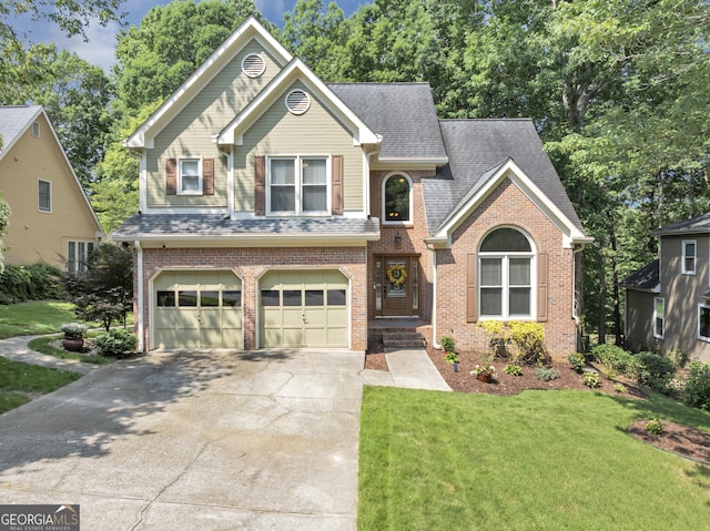 3535 Fairgreen Ct, Douglasville, GA 30135 - view of front of home with driveway, a front lawn, an attached garage, brick siding, and roof with shingles