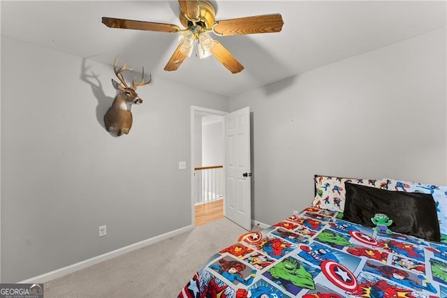 5510 Pilgrim Point Ext, Cumming, GA 30041 - bedroom with light colored carpet, baseboards, and a ceiling fan