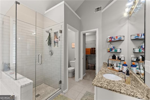 5510 Pilgrim Point Ext, Cumming, GA 30041 - bathroom with vanity, a stall shower, toilet, and tile patterned floors