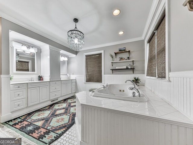 646 Darlington Cir NE, Atlanta, GA 30305 - bathroom with a wainscoted wall, double vanity, a whirlpool tub, a chandelier, and recessed lighting