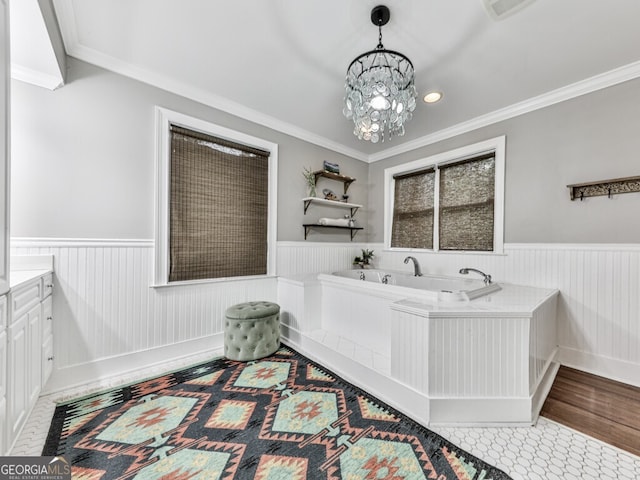 646 Darlington Cir NE, Atlanta, GA 30305 - full bathroom with wainscoting, vanity, a bath, a chandelier, and crown molding