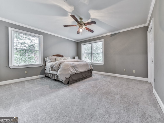 646 Darlington Cir NE, Atlanta, GA 30305 - carpeted bedroom featuring ornamental molding, baseboards, and a ceiling fan