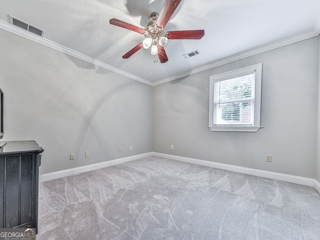646 Darlington Cir NE, Atlanta, GA 30305 - empty room with crown molding, a ceiling fan, carpet floors, and baseboards
