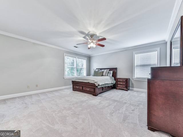 646 Darlington Cir NE, Atlanta, GA 30305 - bedroom featuring ornamental molding, baseboards, multiple windows, carpet floors, and ceiling fan