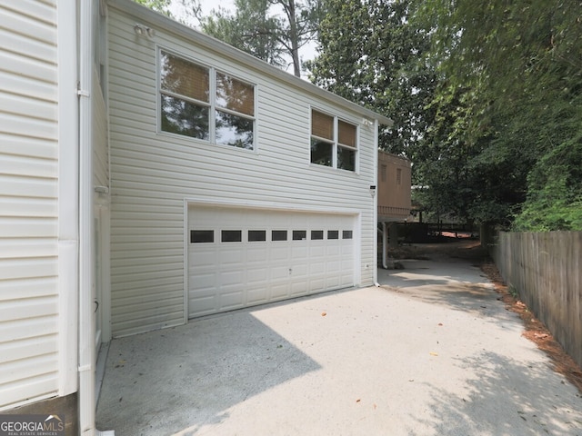 646 Darlington Cir NE, Atlanta, GA 30305 - garage featuring concrete driveway