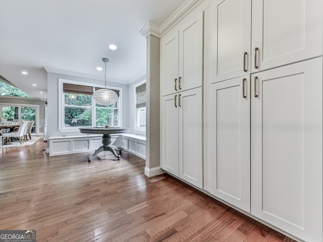 646 Darlington Cir NE, Atlanta, GA 30305 - hall with ornamental molding, light wood-style flooring, and recessed lighting