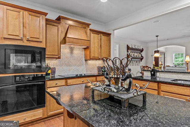 1000 Deep Water Way, Greensboro, GA 30642 - kitchen featuring black appliances, custom range hood, arched walkways, backsplash, and dark stone countertops