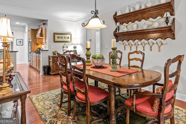 1000 Deep Water Way, Greensboro, GA 30642 - dining space with light wood-type flooring, crown molding, baseboards, and recessed lighting