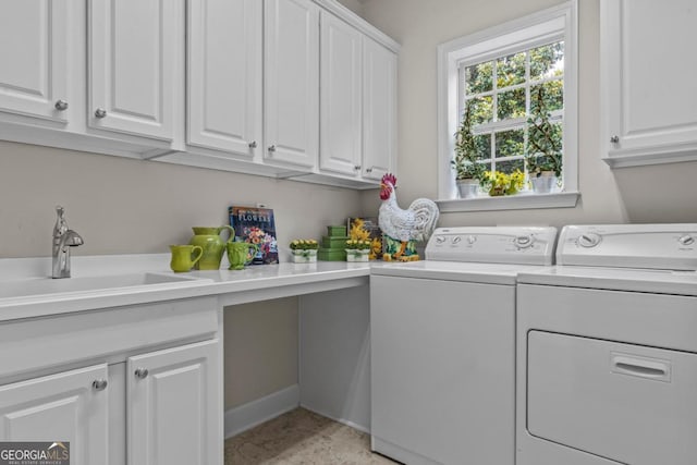 1000 Deep Water Way, Greensboro, GA 30642 - laundry room featuring cabinet space and washing machine and clothes dryer
