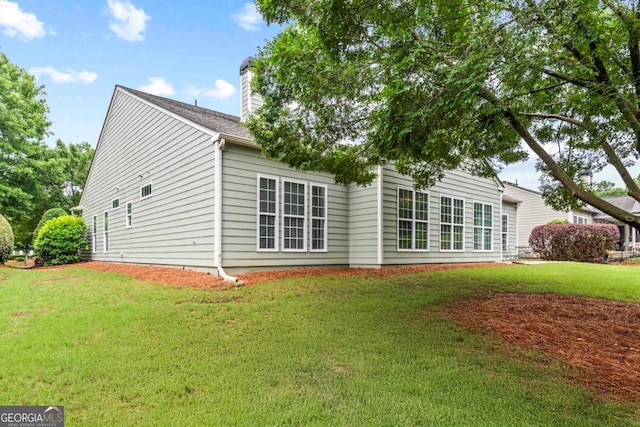 1000 Deep Water Way, Greensboro, GA 30642 - back of property with a lawn and a chimney