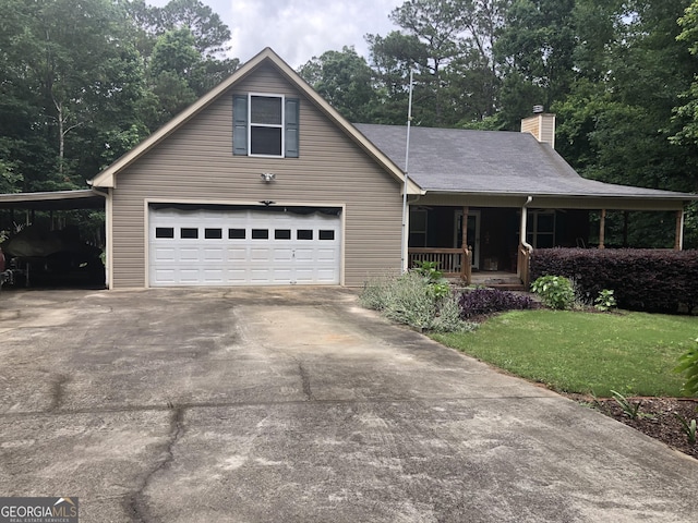 1744 Campbell Rd, Covington, GA 30014 - view of front of home with driveway, a porch, a chimney, a front lawn, and a carport