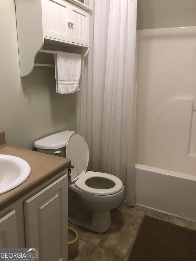 1744 Campbell Rd, Covington, GA 30014 - bathroom with vanity, toilet, and shower / bathtub combination with curtain