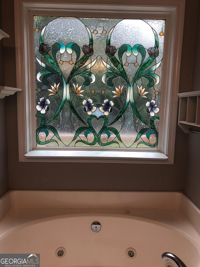 1744 Campbell Rd, Covington, GA 30014 - bathroom featuring a jetted tub