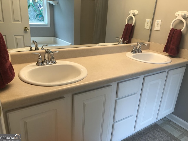 1744 Campbell Rd, Covington, GA 30014 - bathroom with double vanity