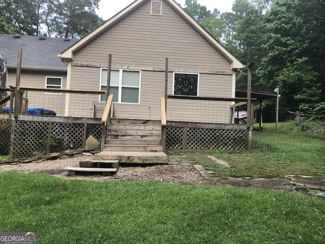1744 Campbell Rd, Covington, GA 30014 - rear view of property with a deck and a lawn