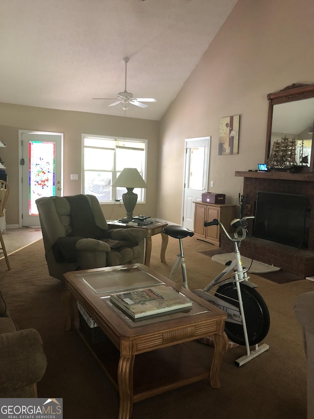 1744 Campbell Rd, Covington, GA 30014 - living room with light carpet, a fireplace, a ceiling fan, and high vaulted ceiling