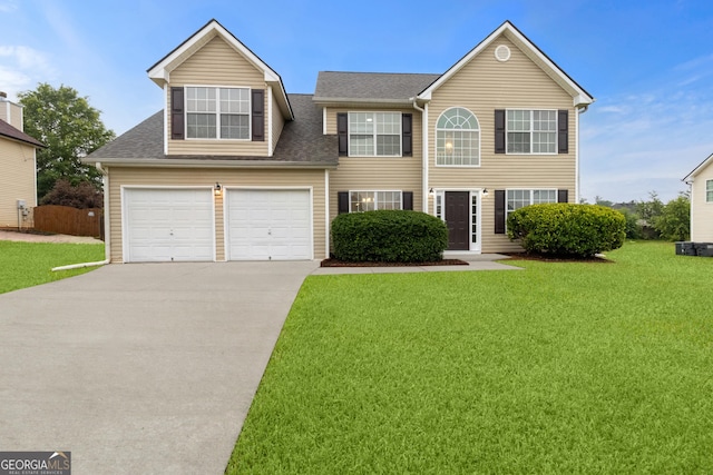 165 Heaton Place Trl, Covington, GA 30016 - colonial inspired home featuring concrete driveway, a front yard, and a garage