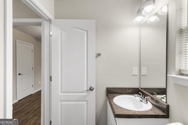 165 Heaton Place Trl, Covington, GA 30016 - half bathroom with vanity and wood finished floors