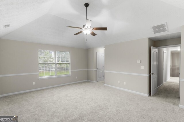 165 Heaton Place Trl, Covington, GA 30016 - unfurnished bedroom featuring carpet flooring, baseboards, and vaulted ceiling