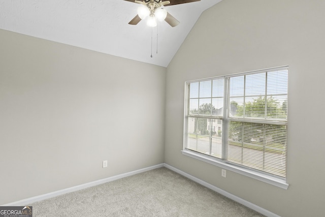 165 Heaton Place Trl, Covington, GA 30016 - spare room with light colored carpet, ceiling fan, baseboards, and lofted ceiling