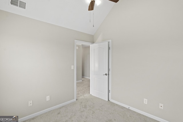 165 Heaton Place Trl, Covington, GA 30016 - carpeted spare room with a ceiling fan, baseboards, and high vaulted ceiling