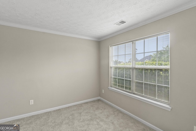 165 Heaton Place Trl, Covington, GA 30016 - unfurnished room featuring baseboards, light colored carpet, crown molding, and a textured ceiling
