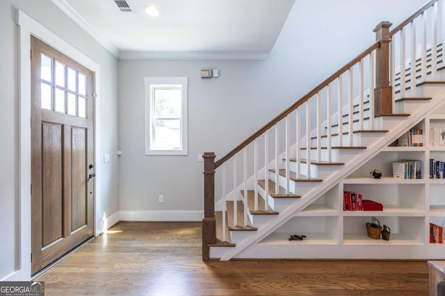 1753 Russell St SE, Atlanta, GA 30316 - entryway with wood finished floors, ornamental molding, stairway, and baseboards